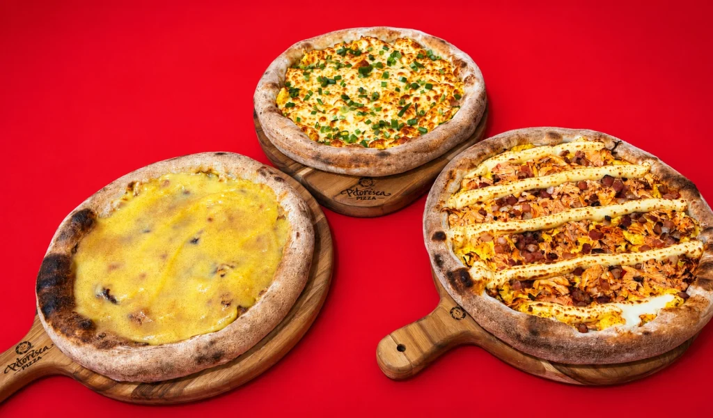 Imagem de destaque - Pizzas de pamonha e curau são aposta de pizzaria curitibana para as festas juninas